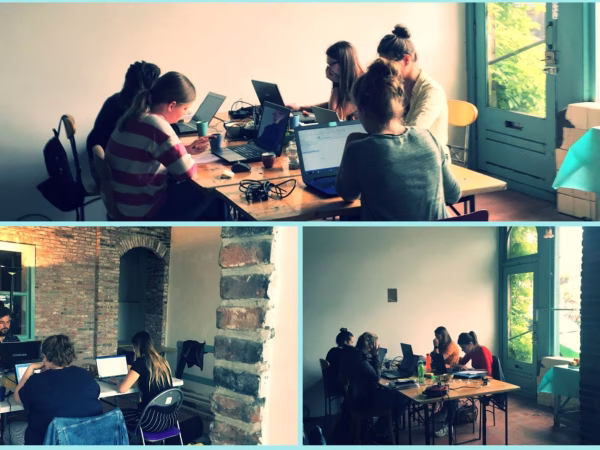 impressie studieruimte waar studenten aan hun scriptiewerken